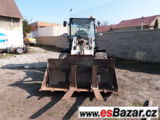 Kloubový nakladač CAT Caterpillar 906H 907H rv2008 3150m.h