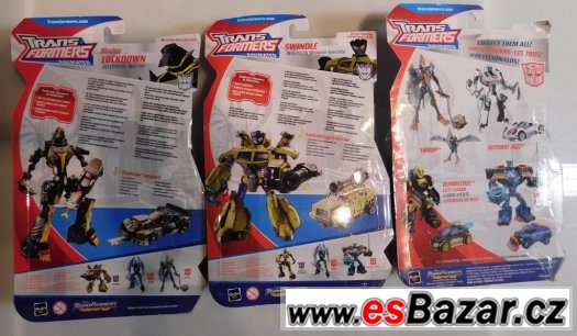 Sada tří Transformers Deluxe od Hasbro.