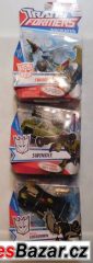 Sada tří Transformers Deluxe od Hasbro.