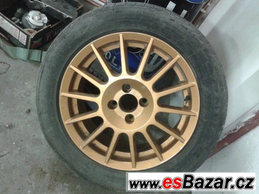 alu kola OZ 6,5x16 H2 4x100 zlaté s pneu 205/55 R16