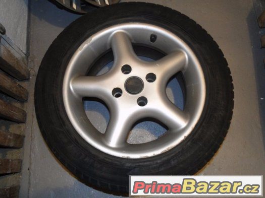 4x disky z lehkých slitin + pneu