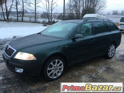 Škoda Octavia II LAURIN & KLEMENT BÍLÁ KŮŽE