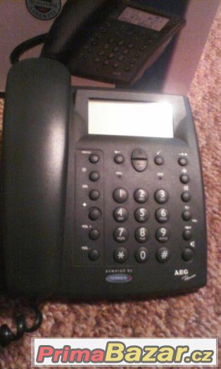 AEG pevný telefon se záznamníkem. 300 Kč.