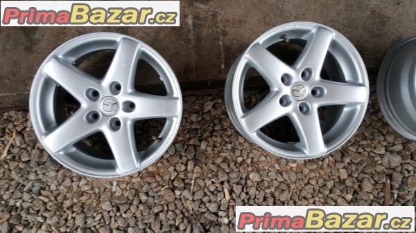 Mazda 5x114.3 7jx15 et42                            r15