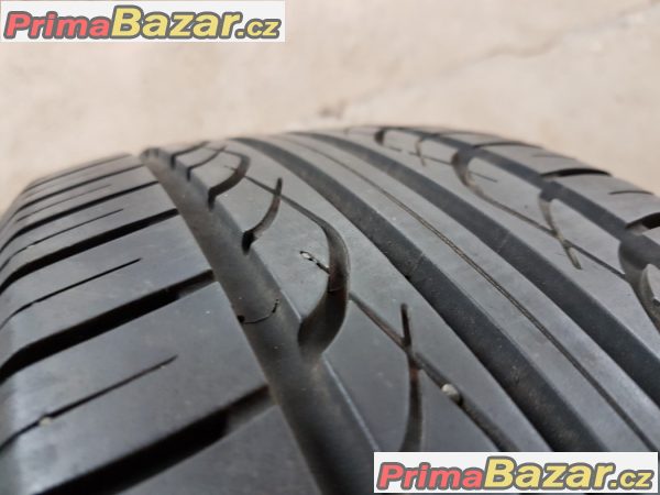 2xplechove disky s pneu a poklickou VW 6Q0601027 5x100 6jx14 et43