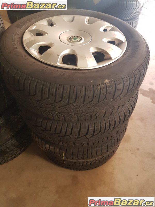 Plechove disky s pneu a poklicema Škoda 1K0601027C 5x112 6jx15 et