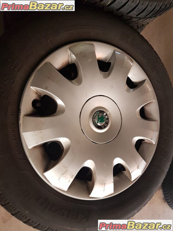 Plechove disky s pneu a poklicema Škoda 1K0601027C 5x112 6jx15 et