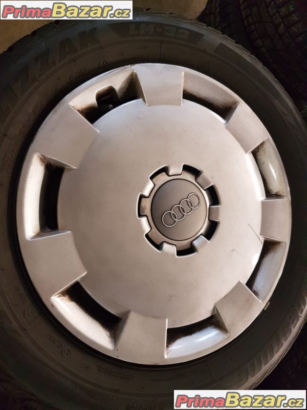 plechové disky s pneu a poklicema Audi Bridgestone LM32 8P0601027 stred 57.1 5x112 6jx16 et50 205/55 r16 91