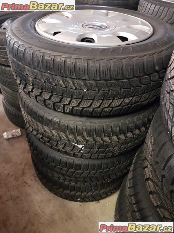 plechové disky s pneu Bridgestone 1K0 5x112 6jx15 et47