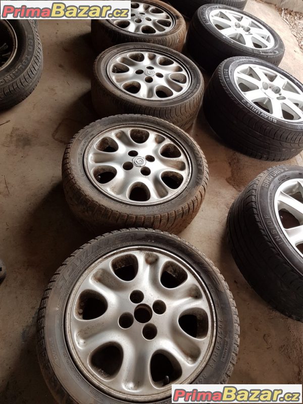 sada alu kola Mazda enkei 4x100 6jx15 et45