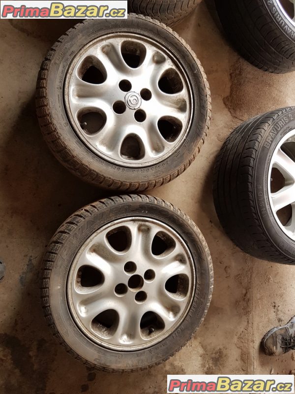 sada alu kola Mazda enkei 4x100 6jx15 et45