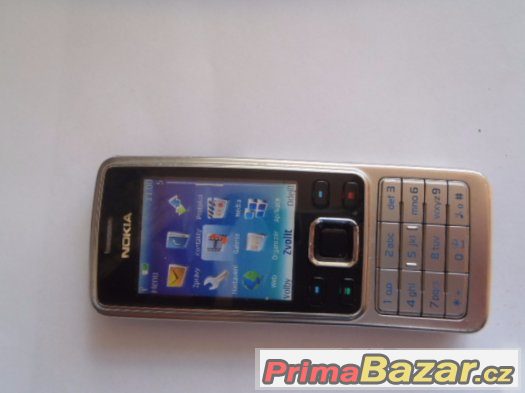 Nokia 6300 s nabíječkou v původním obalu
