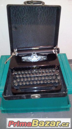 Kufříkový psací stroj CORONA