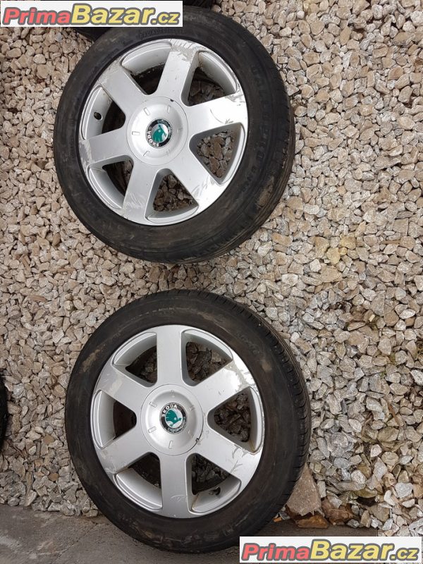 sada alu kola Škoda s pneu Sunny 1Z0601025B 5x112 6.5jx16 et50