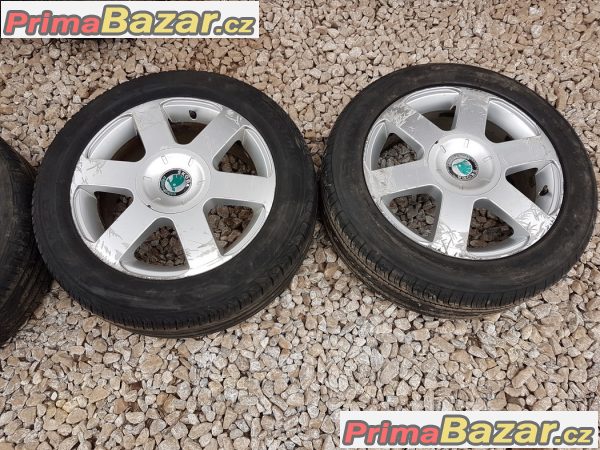 sada alu kola Škoda s pneu Sunny 1Z0601025B 5x112 6.5jx16 et50