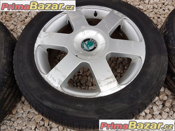 sada alu kola Škoda s pneu Sunny 1Z0601025B 5x112 6.5jx16 et50