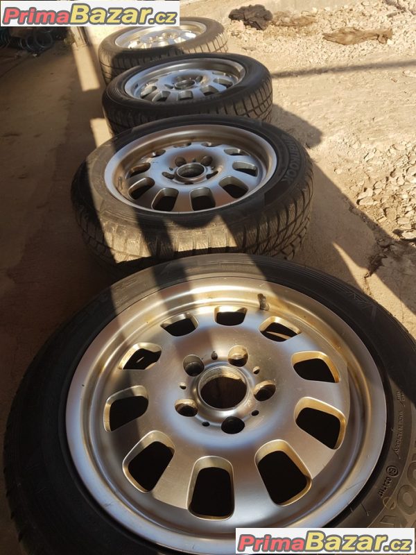 sada alu kola BMW s pneu zanovni Hankook 5x120 7jx16 is47