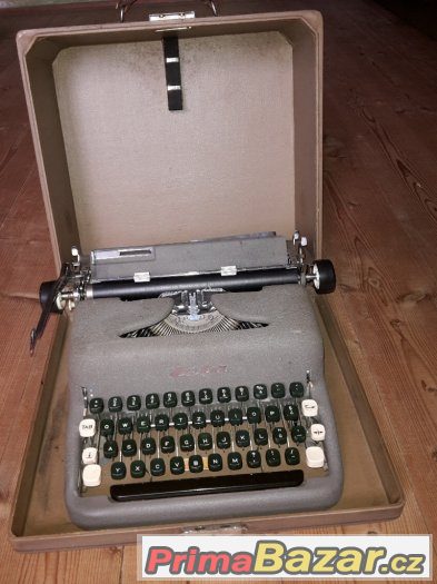 Kufříkový psací stroj Zeta