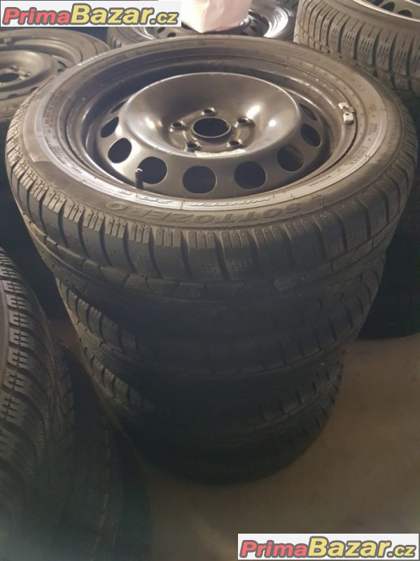 plechové disky s pneu Pirelli na dojeti 30%  8P0 5x112 6jx16 et50