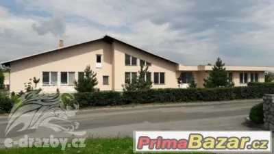 Komerční objekt společnosti AKORD (905 m2) na pozemku (6.533