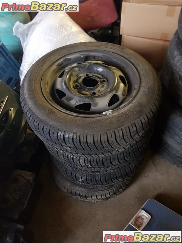 plechove disky s pneu Ford letni 98% vzorek 4x108