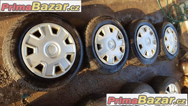 sada plechove disky Ford s pneu 80%  5x108 s poklicema 195/6