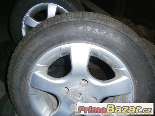 ALU kola GOOD YEAR 185/65 R14