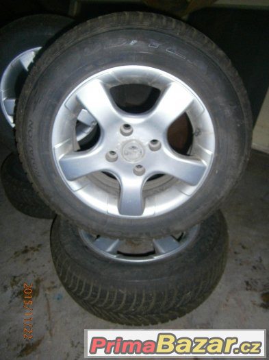 ALU kola GOOD YEAR 185/65 R14