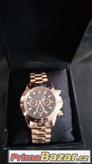 Rolex Oyster Perpetual Cosmograph Daytona 18K Gold.