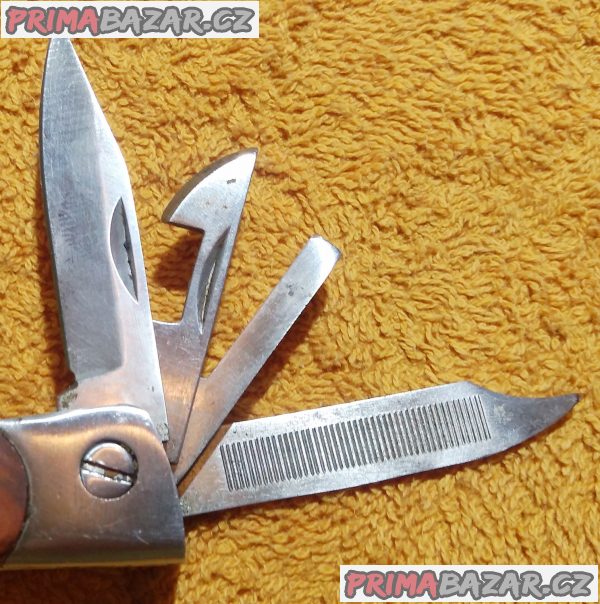 Nový kapesní nerezový nůž - min. 9 funkcí. Nový kapesní nerezový nůž - min. 9 funkcí.