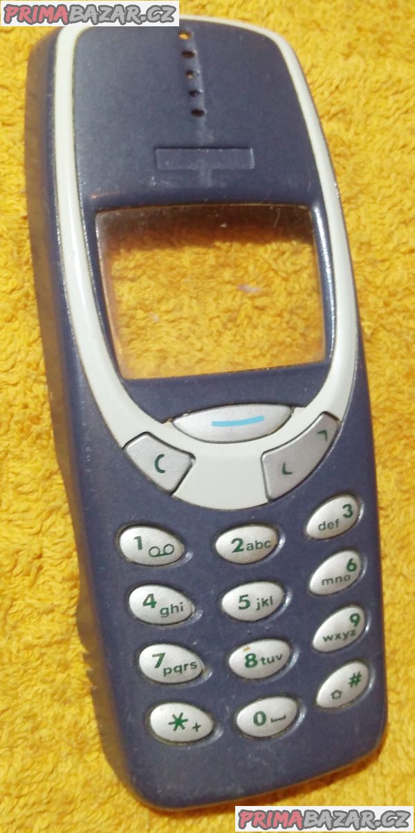 Nokia 3310 - vrchní kryt s klávesnicí a středový plast. Nokia 3310 - vrchní kryt s klávesnicí a středový plast.