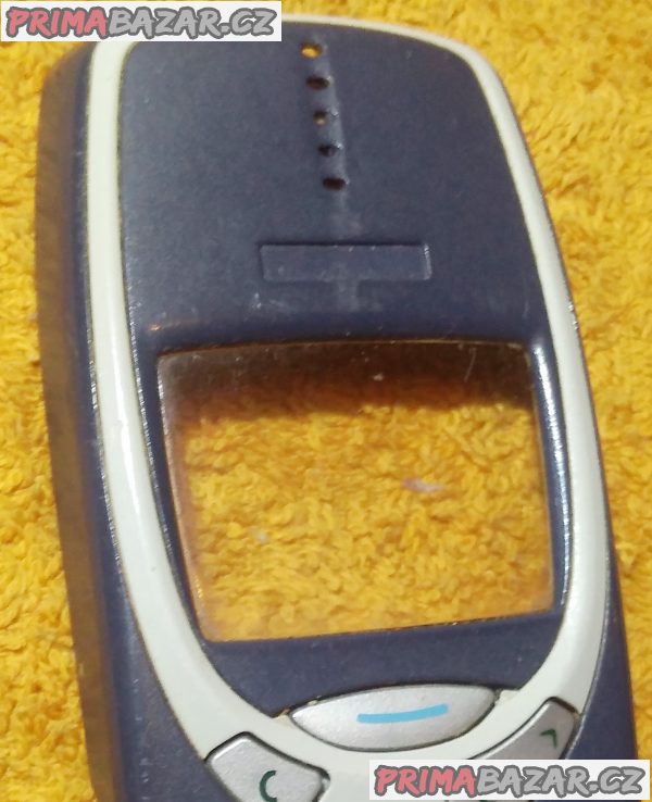 Nokia 3310 - vrchní kryt s klávesnicí a středový plast. Nokia 3310 - vrchní kryt s klávesnicí a středový plast.