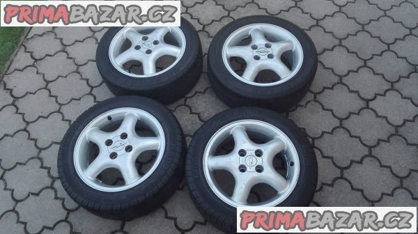 Originální alu kola Opel Tigra + letní pneu (4mm) Originální alu kola Opel Tigra + letní pneu (4mm)