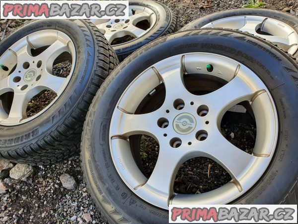 Alu kola Opel Alfa 5x110 6.5jx15 et38 pneu Bridgestone 195/65 r15 91t 90% vzorek zimní  6,5x15 cena je za kompletní sadu 4 d