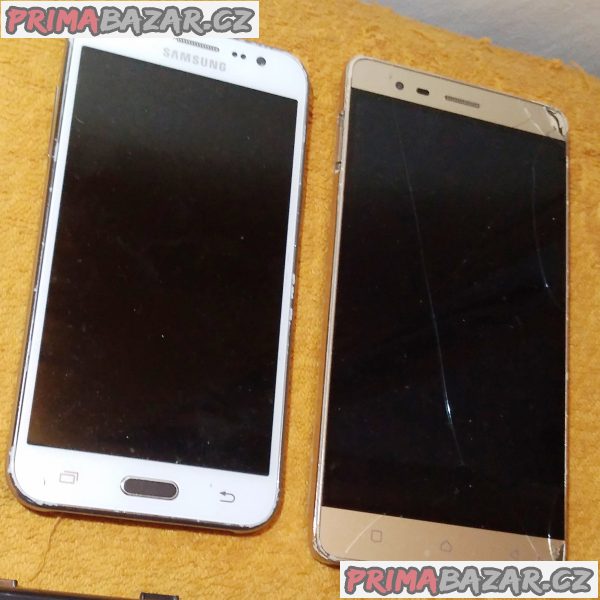 2 dotykové mobily k opravě + baterie pro notebook!!! 2 dotykové mobily k opravě + baterie pro notebook!!!