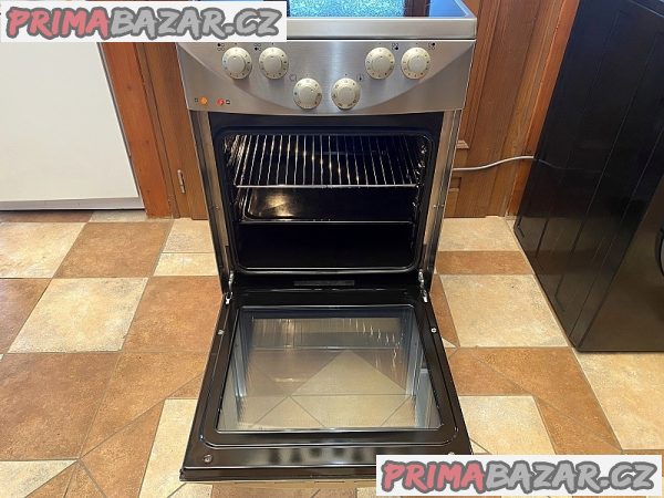 Sporák sklokeramický GORENJE šíře 50 cm nerez horkovzduch