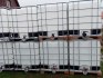 ibc-nadrze-kontejnery-na-1000-litru-cerne-bile