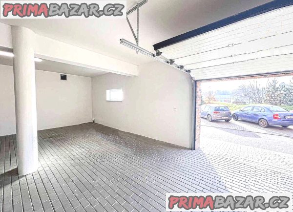 Prodám kryté garážové stání Brno, U Leskavy