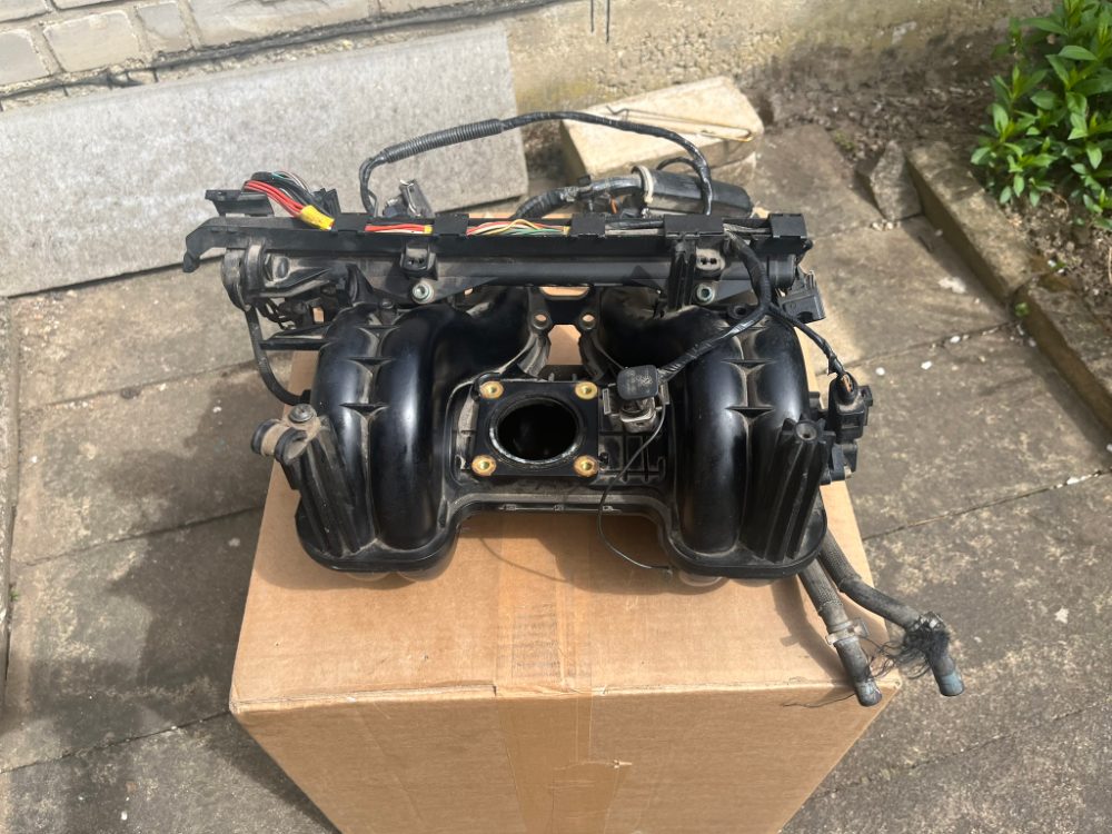 Sání motoru FELICIA 1.6 AEE 032129711G